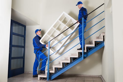 Careful furniture handling during apartment relocation in Gospeloak