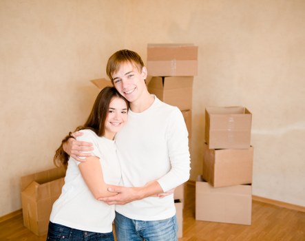 Packed boxes and furniture prepared for small removals in Gospeloak