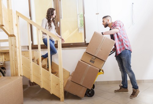 Homeowner organizing belongings with mobile self storage in Gospeloak