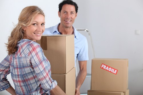 Careful packing of fragile items for house removals in Gospeloak